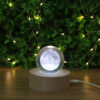 boule en cristal lune socle bois