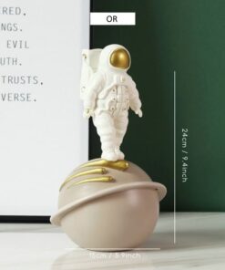 figurine cosmonaute saturne or