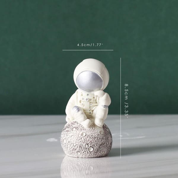 figurine-petit-astronaute-pensant-argent Mini Figurine Astronaute argent